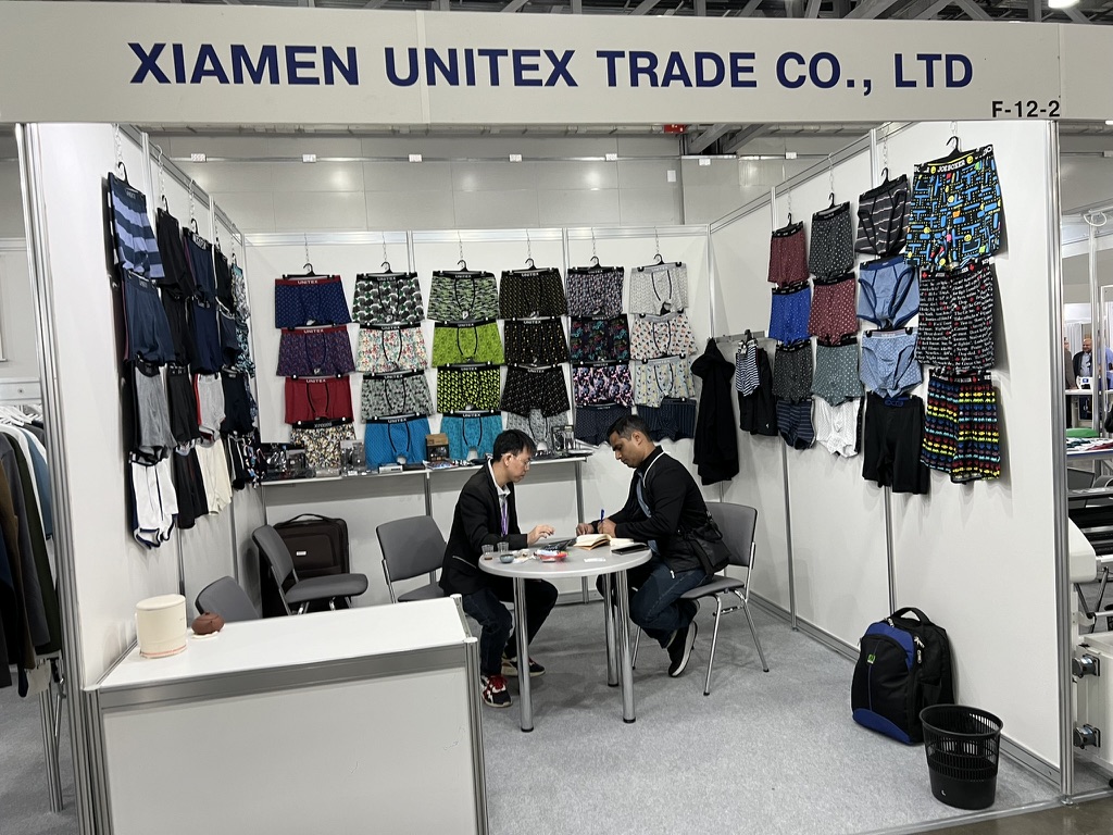 XIAMEN UNITEX TRADE CO., LTD booth at the trade fair — buyer negotiation at stand F-12-2