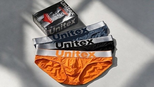 Folded Unitex boxer briefs with a branded packaging box — custom packaging for OEM underwear programmes